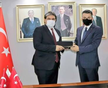 Pakdemirli ve Sarıeroğlu’ndan MHP Adana İl’e ziyaret…
